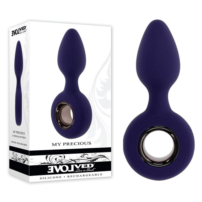 purple bulb shaped head vibrating anal butt plug with ring holder beside display box