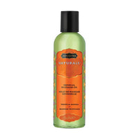 Bottle of Naturals Sensual Massage Oil with tropical mango scent on a white background