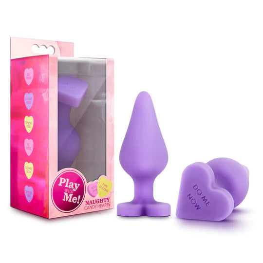 purple butt plug with base that reads do me now