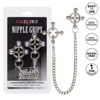 silver nipple press with silver chain next to package