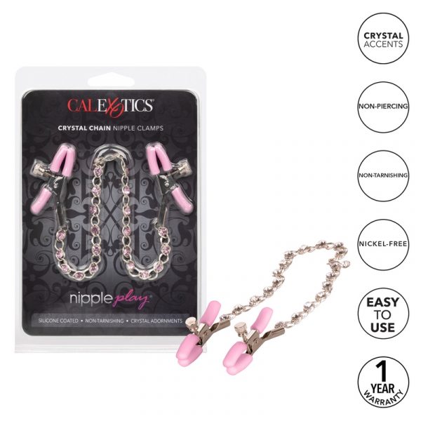 pair of adjustable nipple clamps connected together by jeweled chain next to package