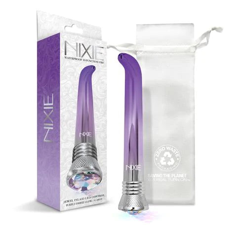shiny purple slim g spot vibrator with a silver cap and a jewel on the base, shown with a white bag and the display box