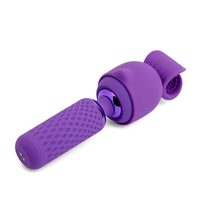 Purple massage with attachment on a white background