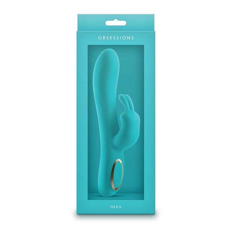 Turquoise vibrator in packaging with 'OBSSESSIONS' branding on a white background