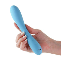 Blue rhett vibrator held in a hand with a white background