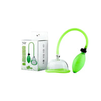 Green and clear pussy pump with packaging on a white background