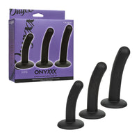 A 3-piece black silicone curved plug set shown with its purple retail packaging box on a plain white background.