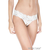 Low rise stretch lace thong with an open crotch, in white front view