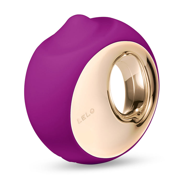 purple massager with clit stimulation with gold finger holder