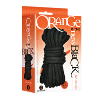 black bondage rope on orange box