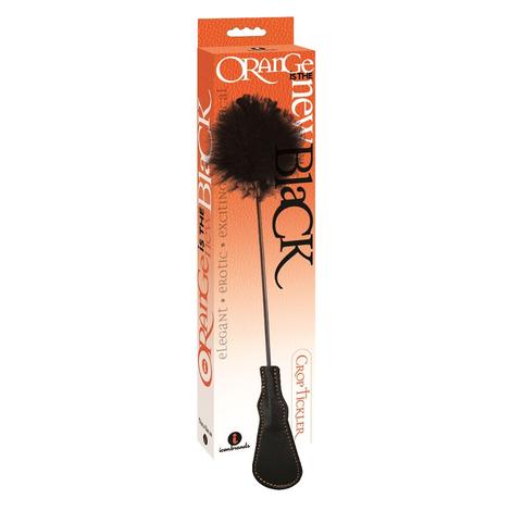 an orange display box depicting a black riding crop with a feather tip