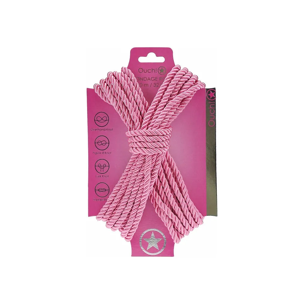 japanese bondage rope on carboard backing, rope displayed in the shape of an x . in pink