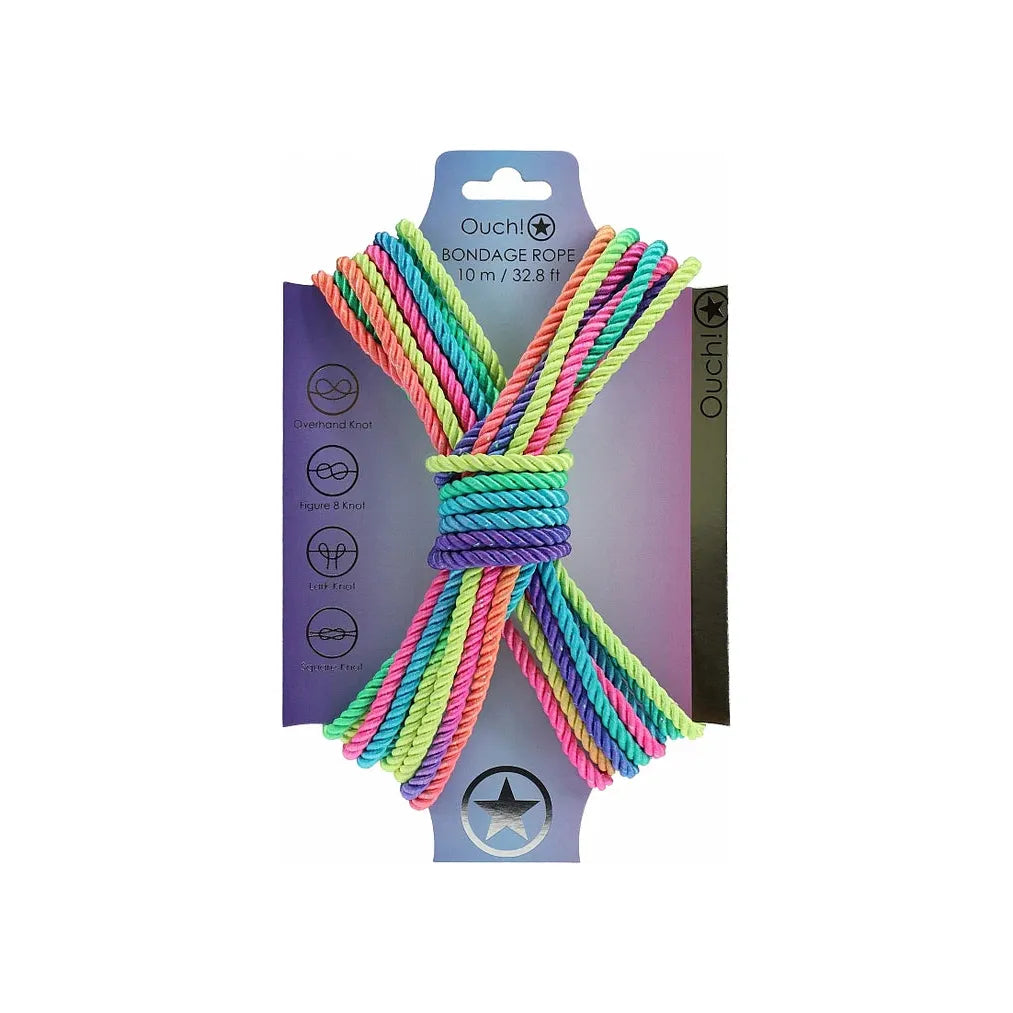 japanese bondage rope on carboard backing, rope displayed in the shape of an x . in rainbow
