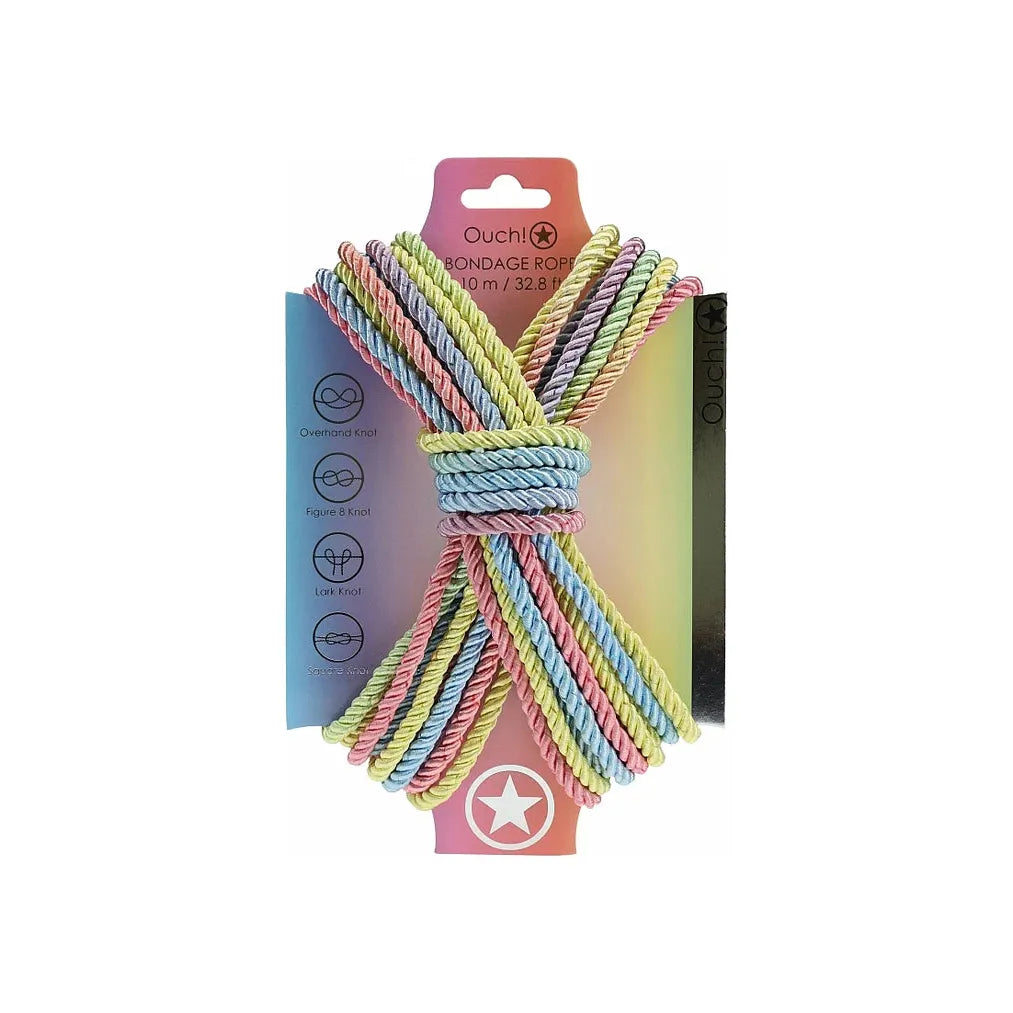 japanese bondage rope on carboard backing, rope displayed in the shape of an x . in pastel