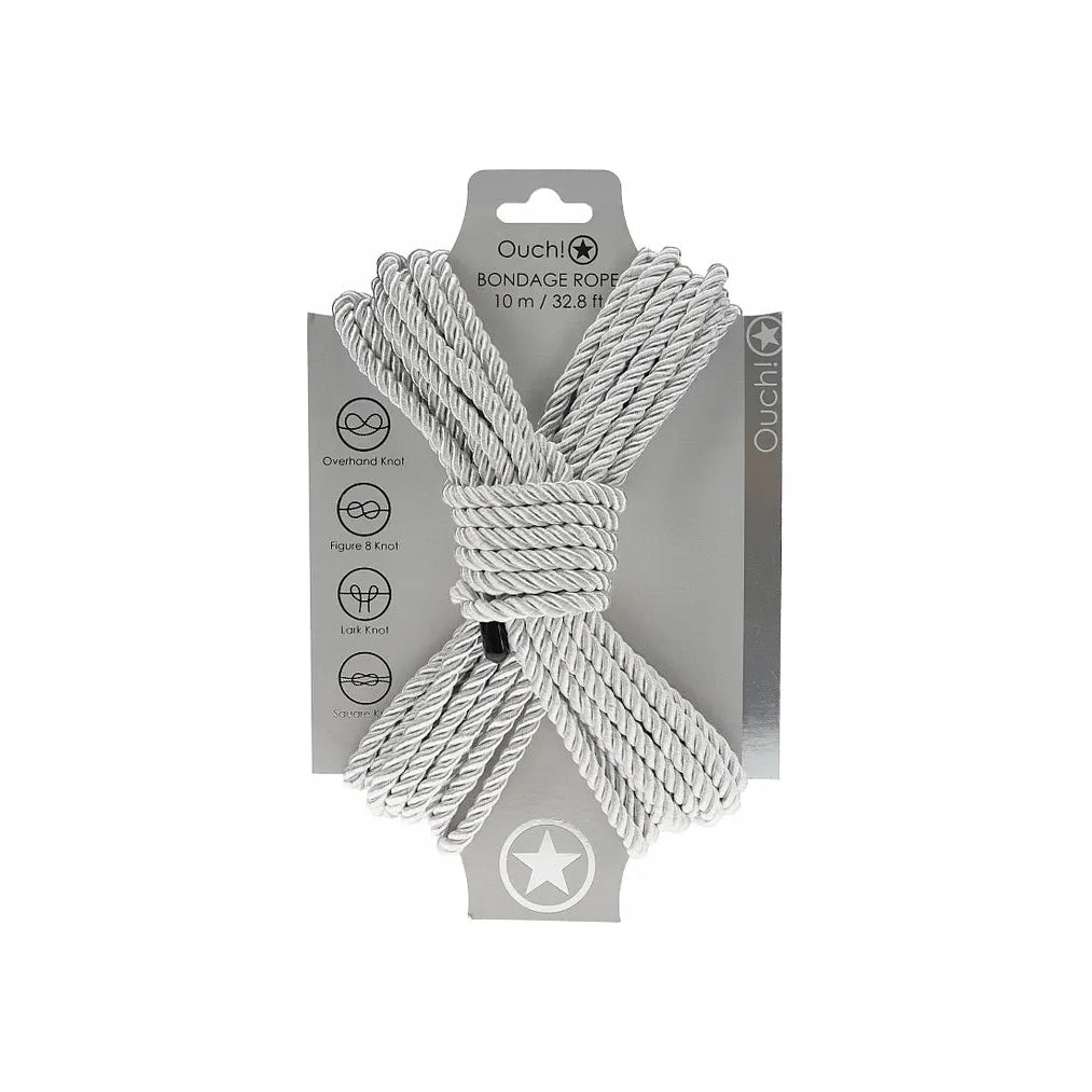 japanese bondage rope on carboard backing, rope displayed in the shape of an x . in silver