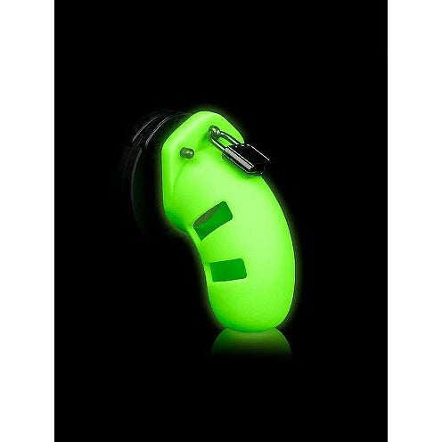 Glow in the dark penis chamber with a black ring and a black lock on the top