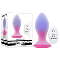 pink bottom with purple ombre top vibrating anal plug with remote control beside box packaging 