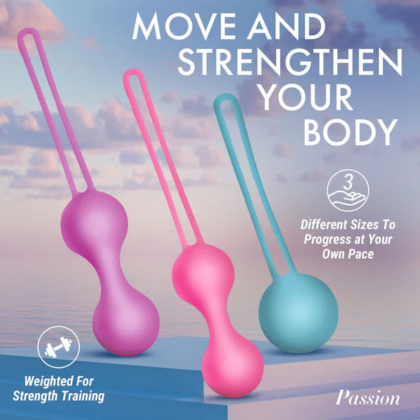 Three weighted kegel balls in pink, purple, and blue with a scenic background.
