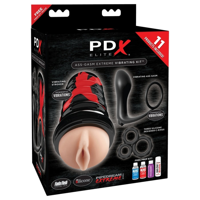 black and red packaging with the masturbator, black anal plug attached to a cockring and three black cockrings on the front. The beige masturbator has a vaginal opening and a black hard shell with a large red x on it