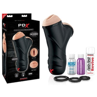 Black and red packaging with the double masturbator on the front. The masturbator has two holes, one with a vaginal opening and the other with a mouth opening. The masturbator has a hard black shell and is standing next to the lube, toy cleaner, fanta flesh and three black cockrings 
