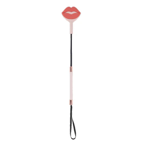 Lip-shaped crop with a black strap on a white background