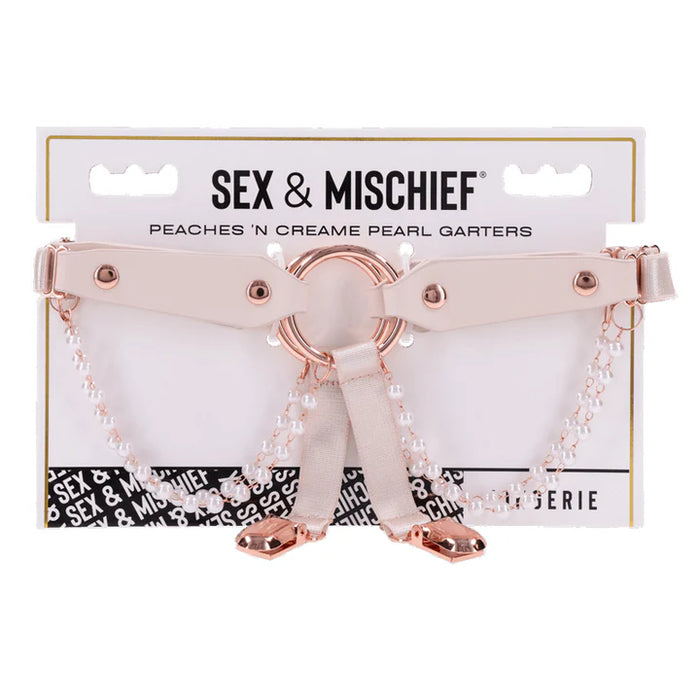 Sex & Mischief garter set with pearl accents on a white background