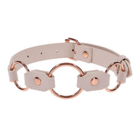 peach leather collar with rose gold hardware on a white background