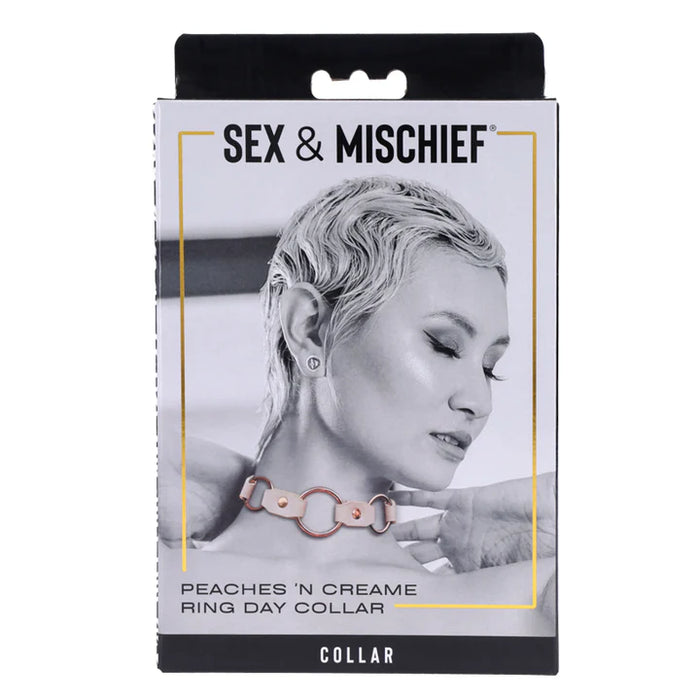Product packaging for 'Peaches 'n Creame Ring Day Collar' by Sex & Mischief with a black and white image of a woman wearing a collar.