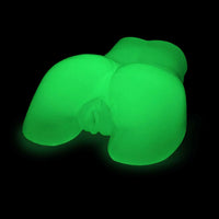 Glowing green vagina & butt peek a booty masturbator on a black background