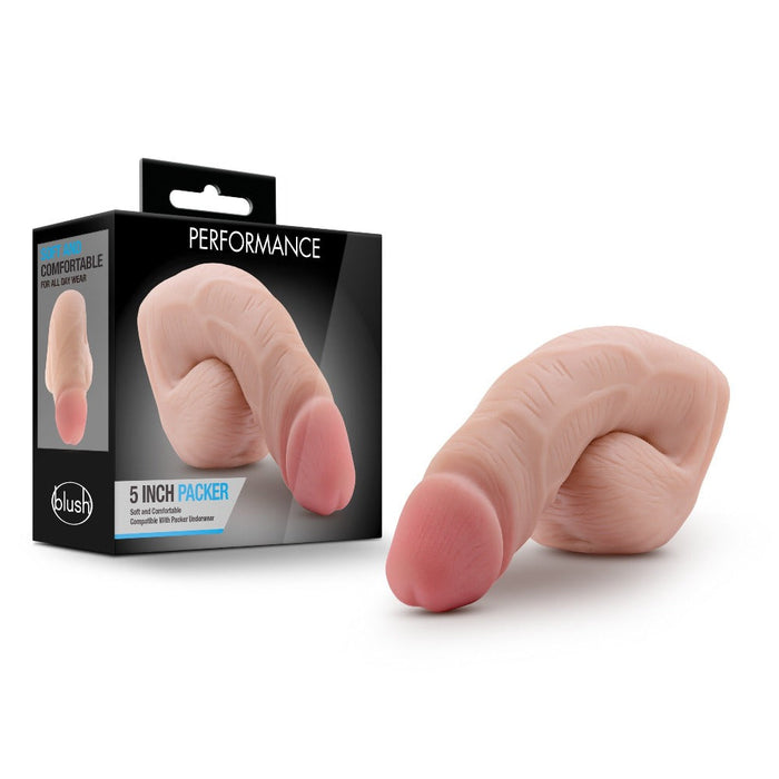 beige dildo packer beside box packaging