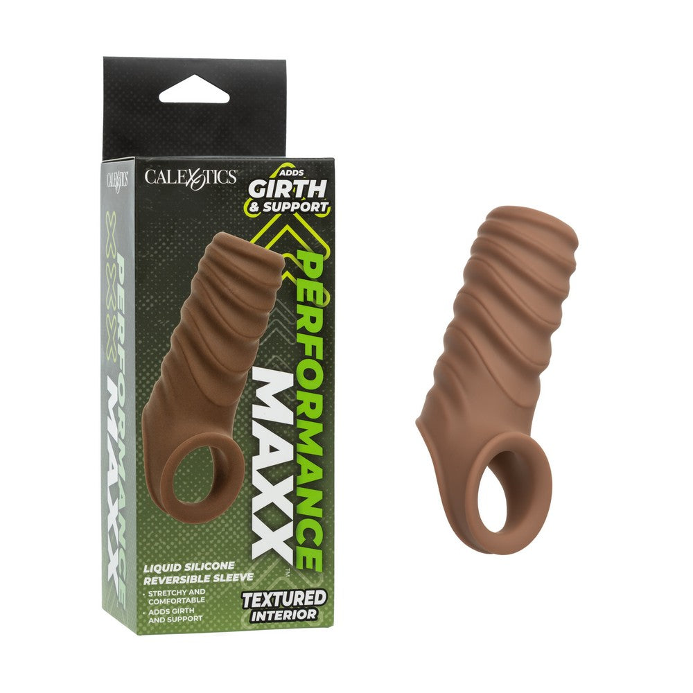 A textured brown liquid silicone reversible sleeve shown next to its green and black retail packaging box, featuring the brand CaleXotics and model Girth & Support Maxx.