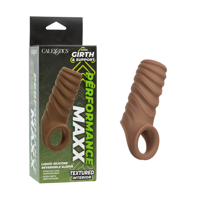 A textured brown liquid silicone reversible sleeve shown next to its green and black retail packaging box, featuring the brand CaleXotics and model Girth & Support Maxx.
