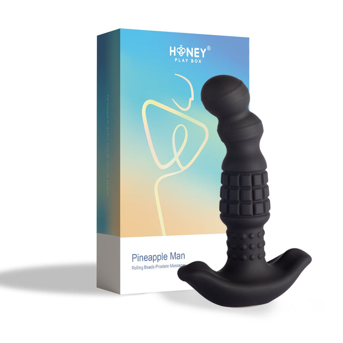 black rolling bead prostate massage beside box