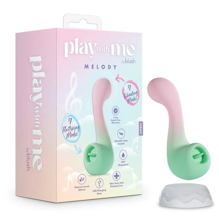 pink and green double ended vibrator. one end g spot curved the other a clitral flicker beside box packaging