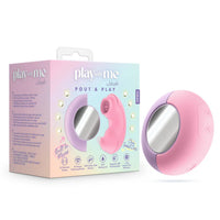 Pink toy with 'play with me' packaging on a white background