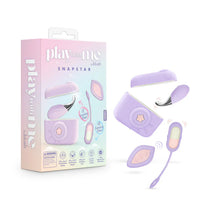 Play With Me Snapstar by Blush wearable vibrator set in pastel purple featuring a vibrating egg, remote control, charging case, and interchangeable accessories, shown alongside retail packaging.