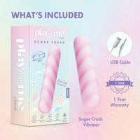 pink  swirl vibrating bullet beside box packaging