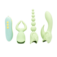 Set of green silicone toys on a white background