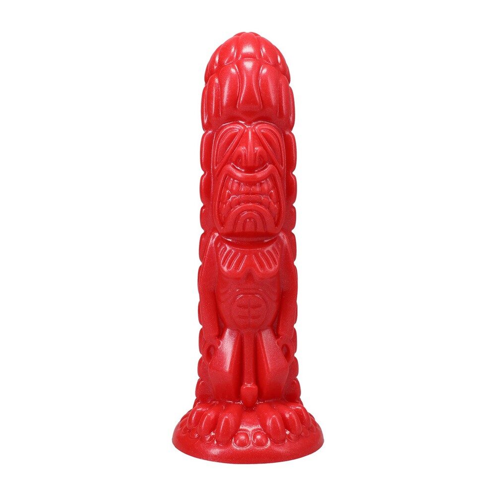 Red tiki dildo with a face on a white background