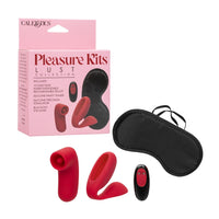 Cal exotics Pleasure Kits Lust Collection kit containing a pink retail box, a black eye mask, a red silicone tray, a red silicone stimulator, and a small black remote with a red button, all on a white background.