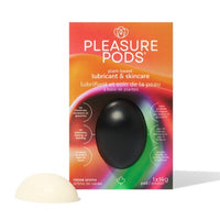 Pleasure Pods plant based lubricant with a black sphere and cocoa aroma pod on a white background