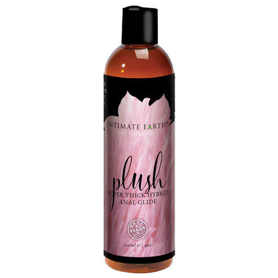 The product comes in an amber bottle with a black lid. It has a black label with a pink flower detail and black writing.
