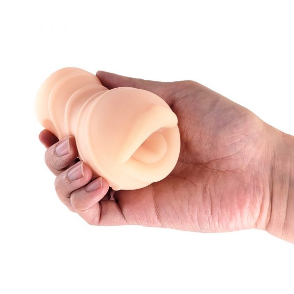 Hand holding a pocket pal mouth masturbator product on a white background