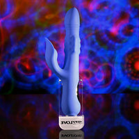 Blue vibrator with clitoral stimulator with 'EVOLVED' branding against a colorful abstract background