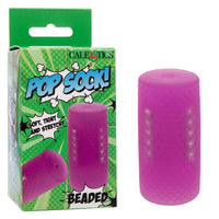 purple tube masturbator with beads inside for texture feel, beside box packaging
