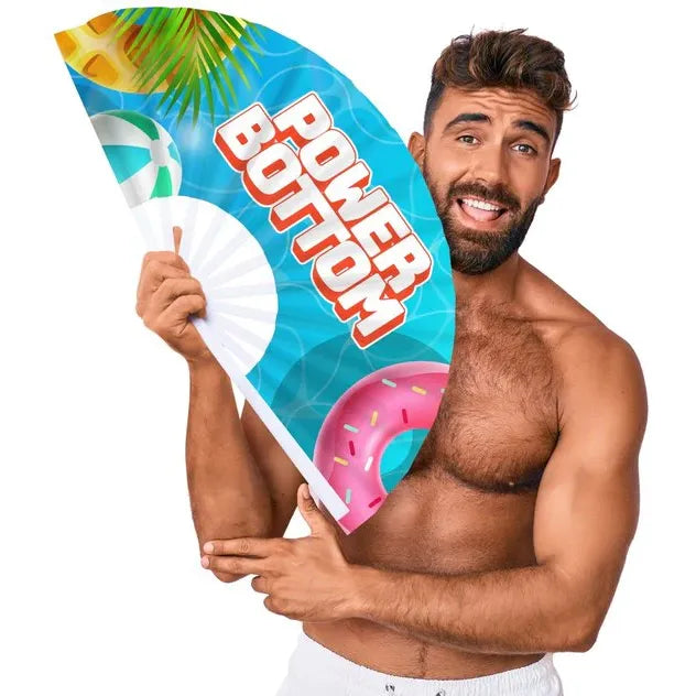 Man holding a 'Power Bottom' fan with a colorful design