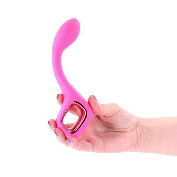 Pink vibrator with a curved handle held in a hand on a white background
