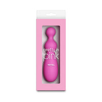 Pink petal vibrator in a pink box with 'pretty in pink' branding on a white background
