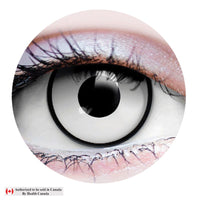 Close-up of a colored contact lens with a white background