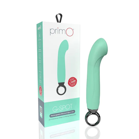 pastel green g spot vibrator with a metallic pull ring at the base, shown next to its white display box